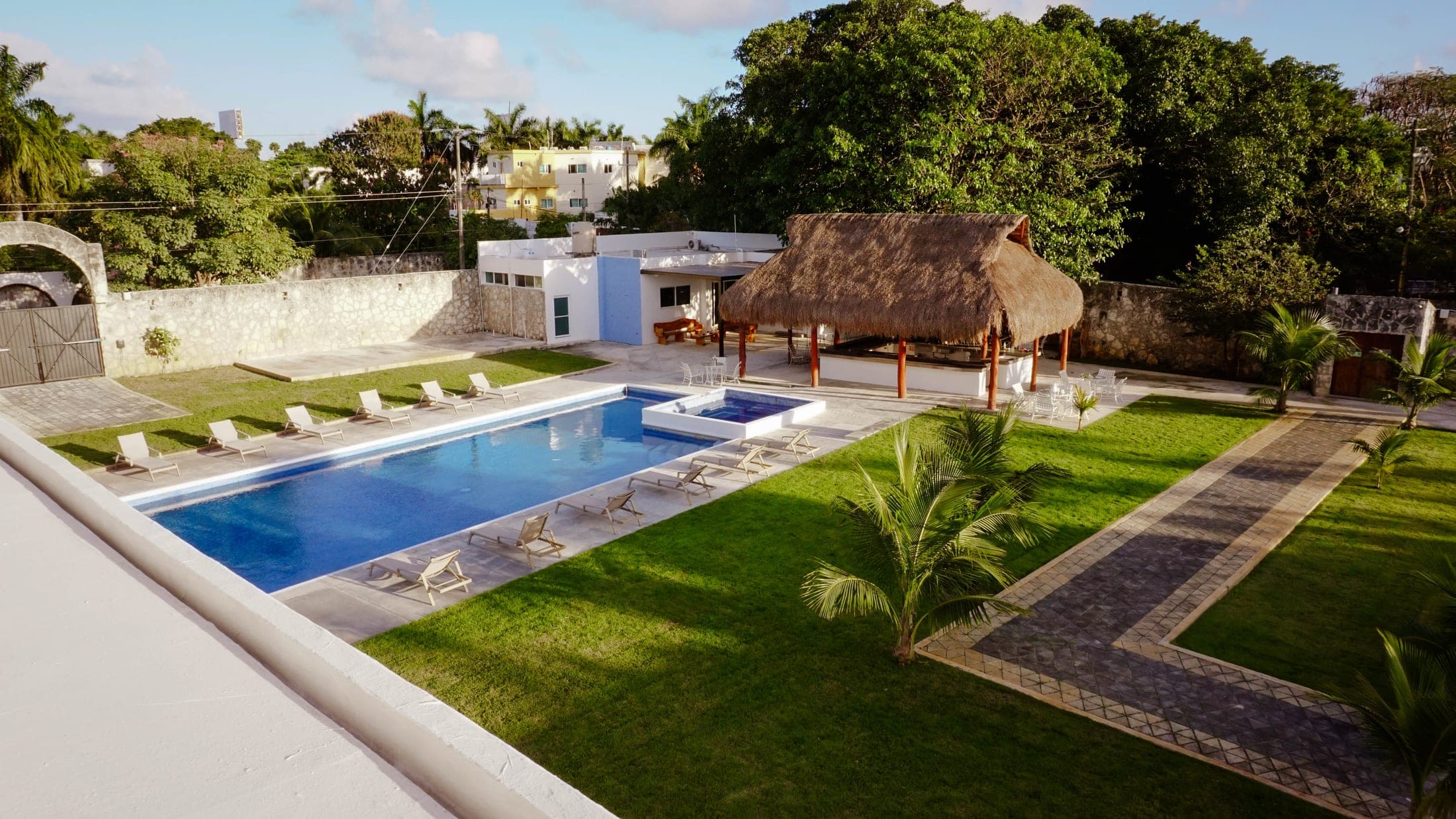 Aerial view of the pool, jacuzzi and gardens at Casa Muranta